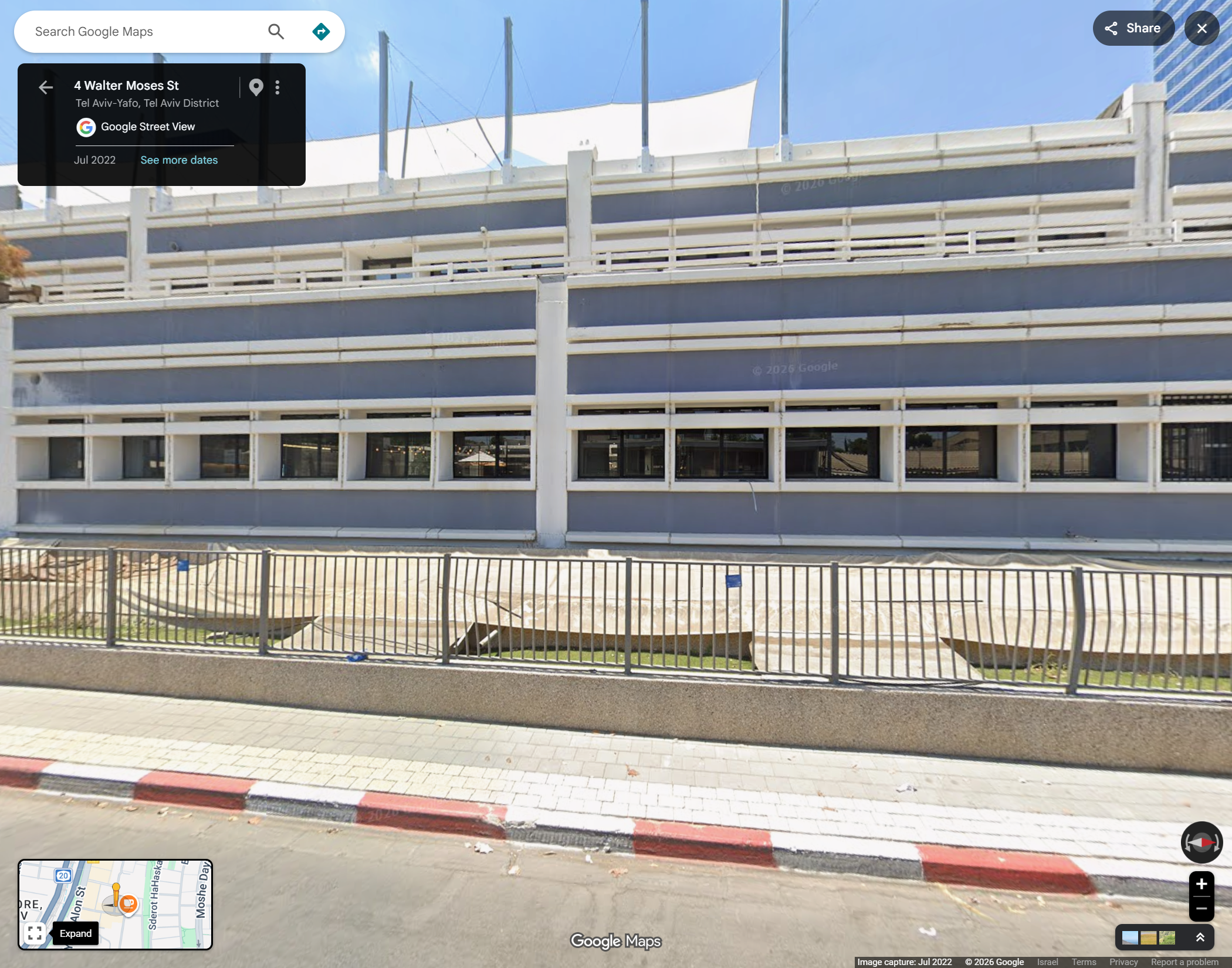 Whole source photograph of Walter's blue and white street frontage